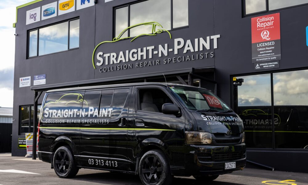 image of Straight-N-Paint branded company car parked outside of automotive repair workshop near Christchurch, Canterbury