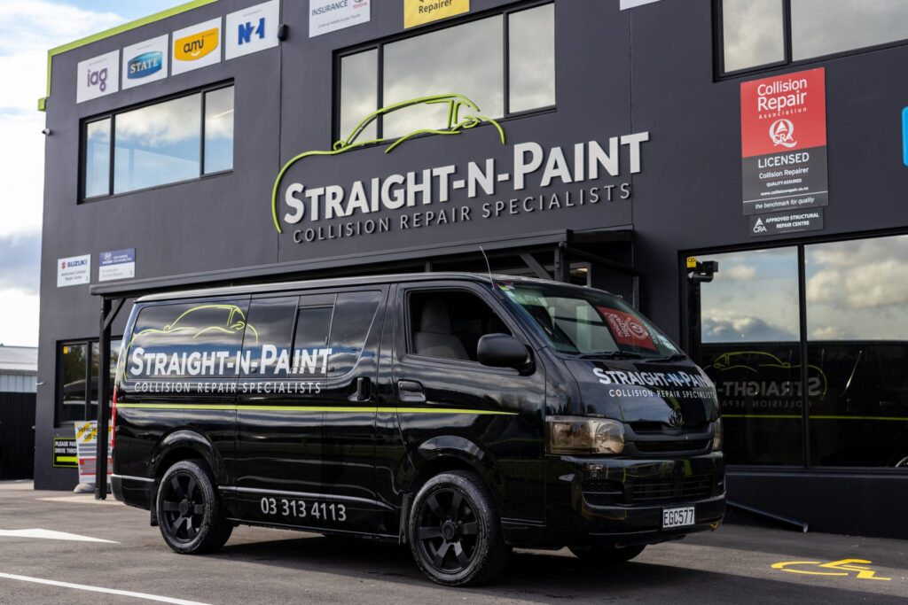 image of Straight-N-Paint branded company car parked outside of automotive repair workshop near Christchurch, Canterbury