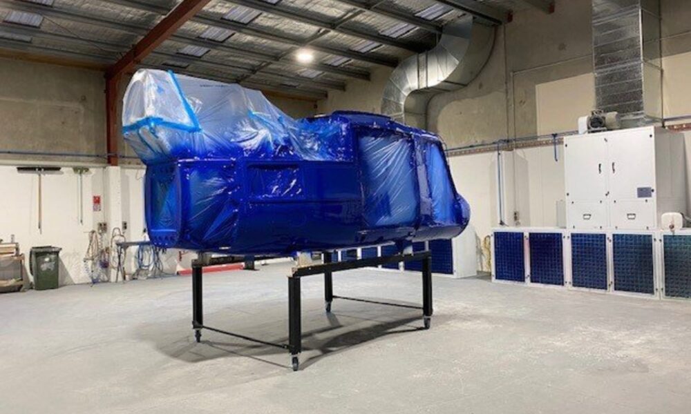 image of helicopter wrapped up ready for collision repair by Straight-N-Paint in Rangiora workshop